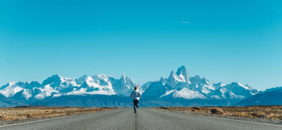 person running on road at daytime